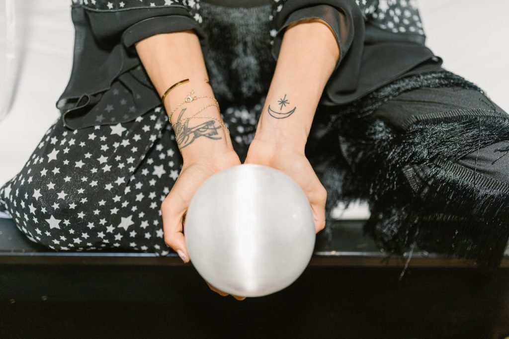 holding crystal ball